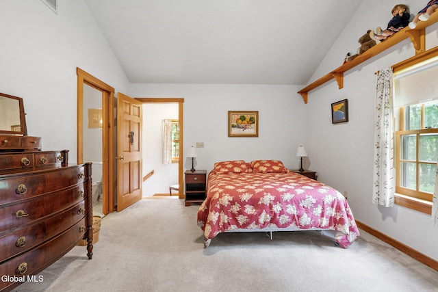 135 Willow St, Guilderland, NY 12084 - carpeted bedroom featuring vaulted ceiling and baseboards