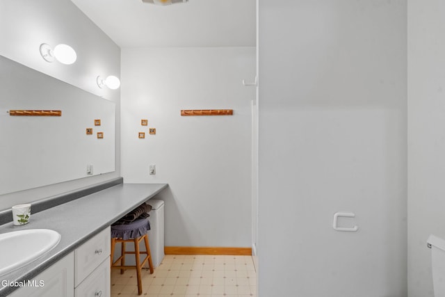 135 Willow St, Guilderland, NY 12084 - bathroom featuring tile patterned floors and vanity
