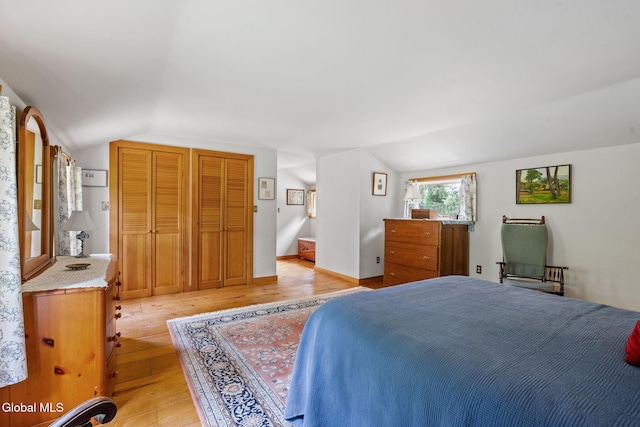 135 Willow St, Guilderland, NY 12084 - bedroom with lofted ceiling and light wood finished floors