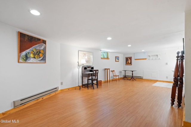 135 Willow St, Guilderland, NY 12084 - recreation room with a baseboard radiator, recessed lighting, and wood finished floors
