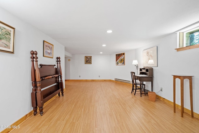 135 Willow St, Guilderland, NY 12084 - living area featuring wood finished floors, recessed lighting, and a baseboard radiator