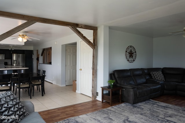 367 Buel Rd, Canajoharie, NY 13317 - living area with ceiling fan, light wood-style flooring, and a baseboard radiator