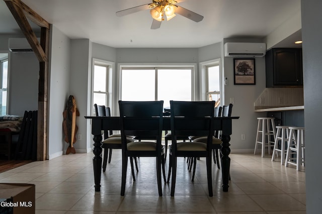 367 Buel Rd, Canajoharie, NY 13317 - dining space featuring an AC wall unit, a ceiling fan, and light tile patterned floors