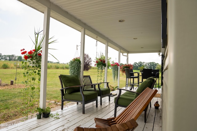 367 Buel Rd, Canajoharie, NY 13317 - wooden porch with a lawn