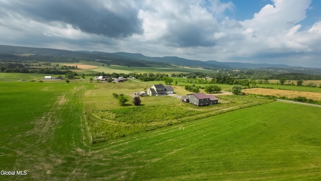 367 Buel Rd, Canajoharie, NY 13317 - overview of rural landscape featuring agricultural land and a mountain backdrop