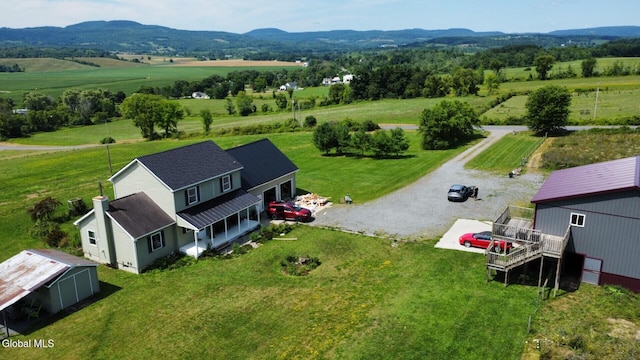 367 Buel Rd, Canajoharie, NY 13317 - overview of rural landscape with a mountain backdrop