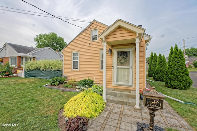1752 Van Cortland St, Schenectady, NY 12303 - view of front of property with a front lawn and entry steps