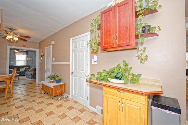 1752 Van Cortland St, Schenectady, NY 12303 - kitchen featuring ceiling fan, light countertops, and open floor plan