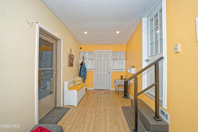 1752 Van Cortland St, Schenectady, NY 12303 - entrance foyer featuring light wood-style floors, stairway, and recessed lighting