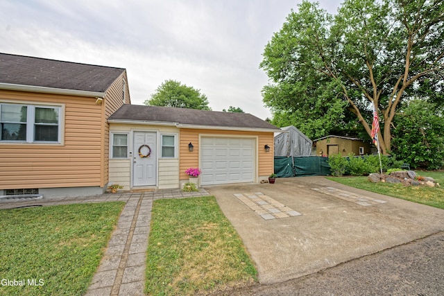 1752 Van Cortland St, Schenectady, NY 12303 - view of front of property with driveway and a garage