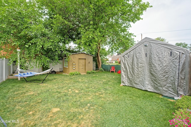 1752 Van Cortland St, Schenectady, NY 12303 - fenced backyard featuring a storage shed