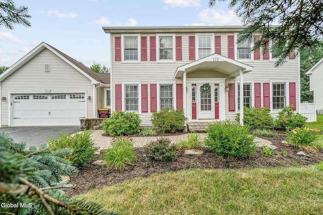 125 Halfmoon Dr, Guilderland, NY 12009 - colonial-style house featuring driveway and a garage