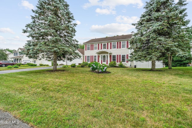 125 Halfmoon Dr, Guilderland, NY 12009 - colonial home with a chimney and driveway