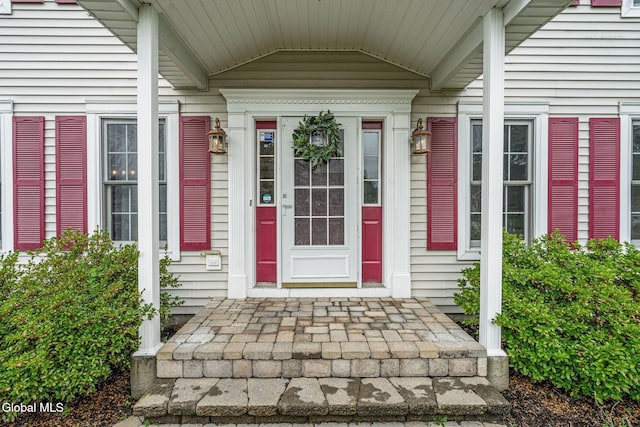 125 Halfmoon Dr, Guilderland, NY 12009 - property entrance featuring covered porch