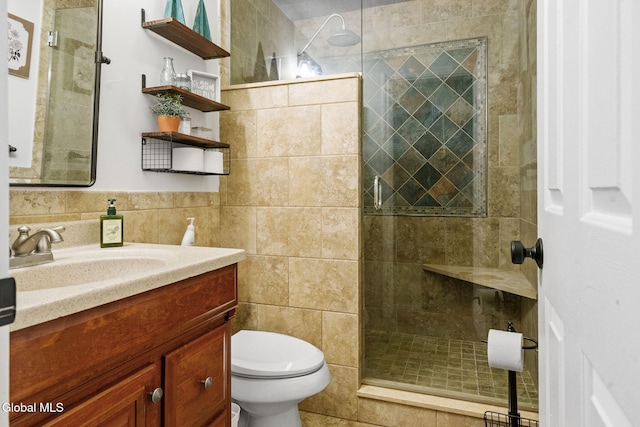 125 Halfmoon Dr, Guilderland, NY 12009 - full bath featuring vanity, walk in shower, and tile walls