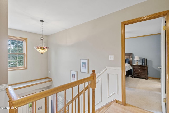 125 Halfmoon Dr, Guilderland, NY 12009 - hallway with an upstairs landing and light wood-type flooring