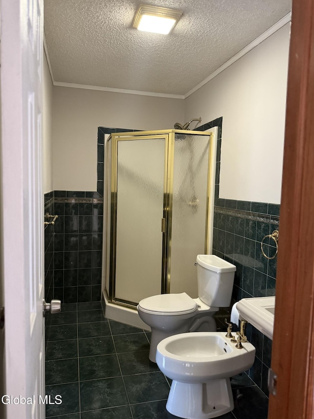 5 Crowsnest Ct, Halfmoon, NY 12188 - bathroom with tile walls, a bidet, a textured ceiling, wainscoting, and crown molding