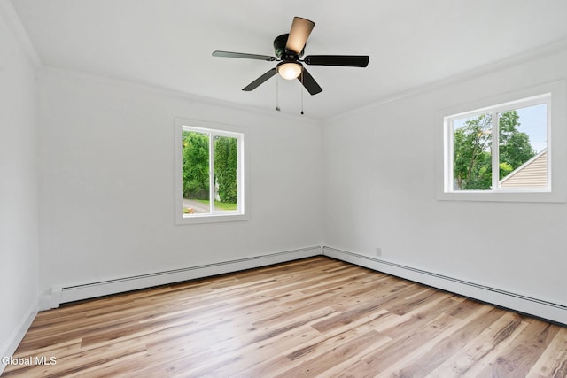 10 Perry Ave, Colonie, NY 12110 - spare room with crown molding, light wood-style floors, a baseboard radiator, and ceiling fan