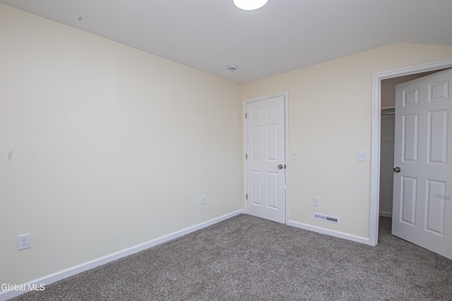 1628 Hawthorne St, Schenectady, NY 12303 - unfurnished bedroom featuring carpet flooring and a walk in closet