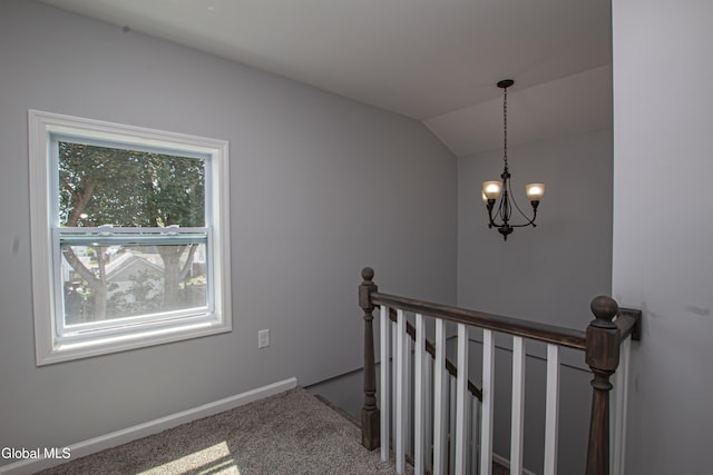 1628 Hawthorne St, Schenectady, NY 12303 - staircase featuring a chandelier, carpet, and vaulted ceiling
