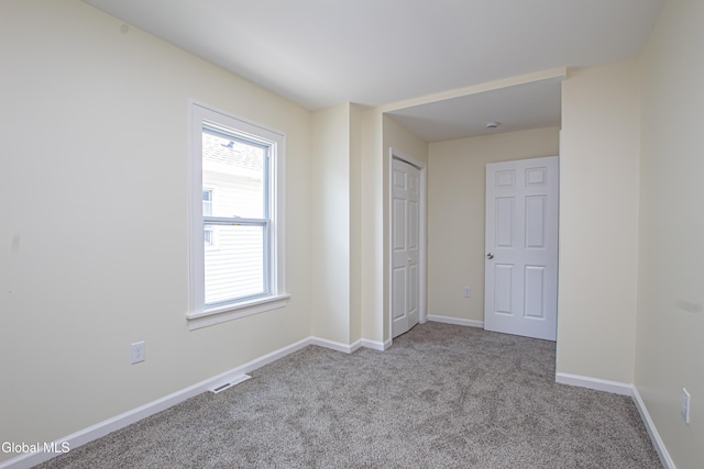 1628 Hawthorne St, Schenectady, NY 12303 - unfurnished bedroom featuring carpet flooring and baseboards