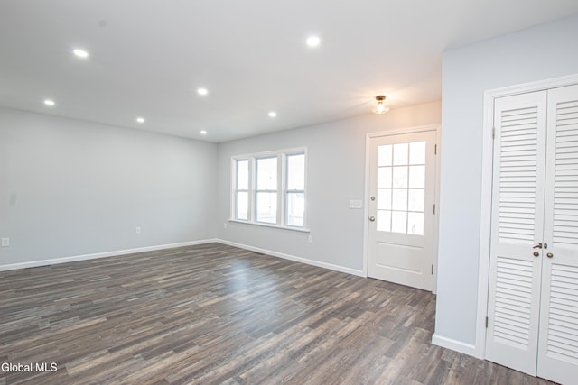 1628 Hawthorne St, Schenectady, NY 12303 - unfurnished living room with dark wood-style flooring and recessed lighting
