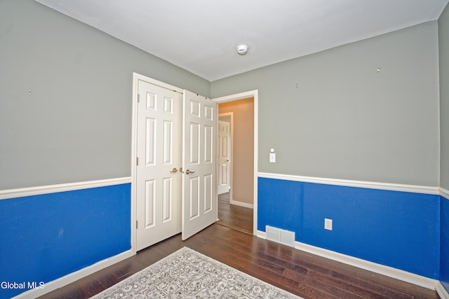 50 Sandy Ln, Bethlehem, NY 12158 - unfurnished bedroom featuring wood finished floors and a closet
