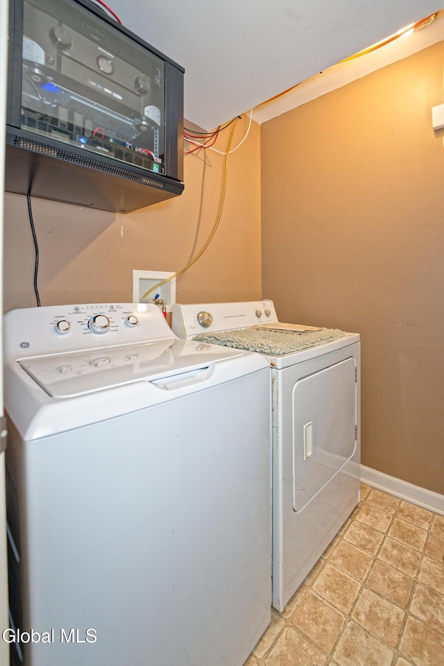 50 Sandy Ln, Bethlehem, NY 12158 - laundry area featuring independent washer and dryer