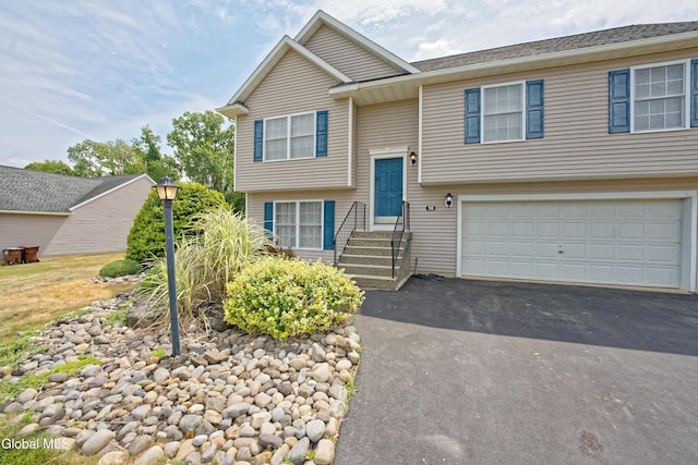 50 Sandy Ln, Bethlehem, NY 12158 - raised ranch featuring driveway and an attached garage