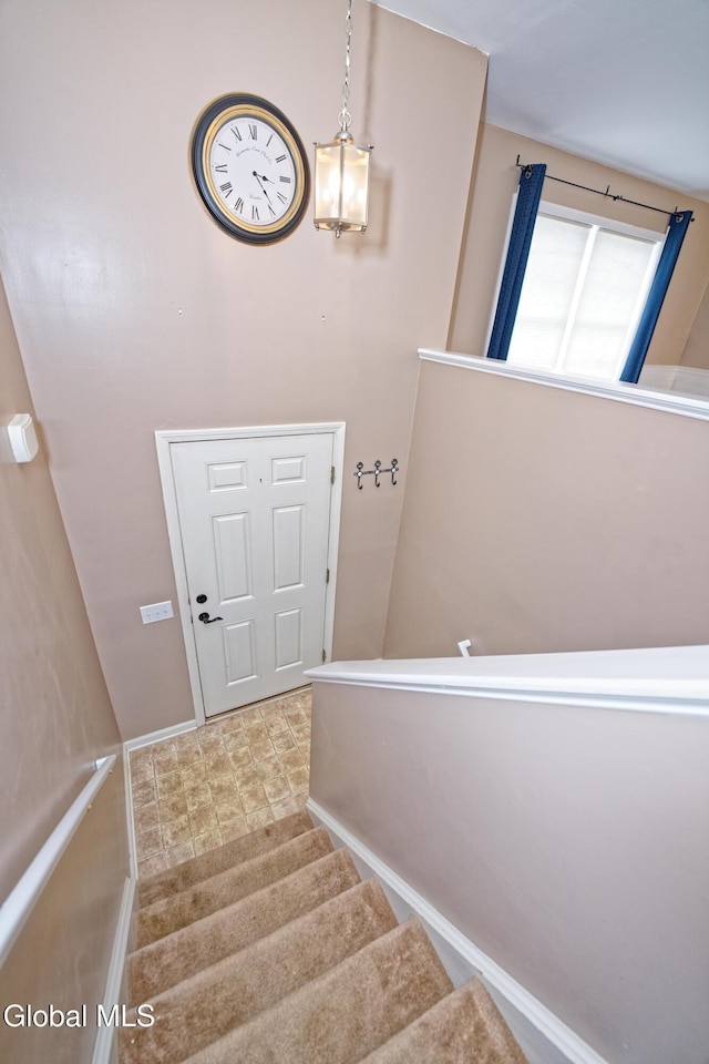 50 Sandy Ln, Bethlehem, NY 12158 - staircase featuring a chandelier