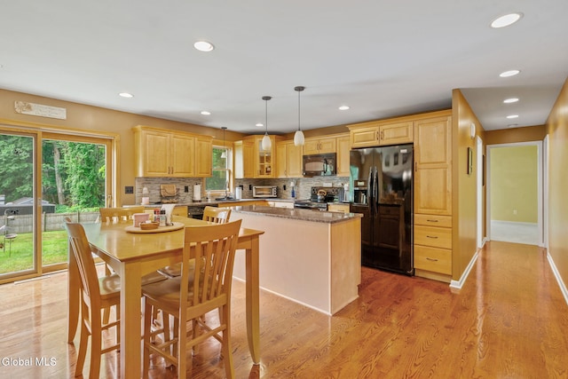 145 Sylvia Ln, Rotterdam, NY 12306 - dining room with plenty of natural light, light wood finished floors, and recessed lighting