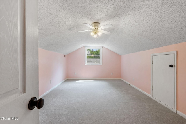 145 Sylvia Ln, Rotterdam, NY 12306 - bonus room with a textured ceiling, vaulted ceiling, carpet, and ceiling fan