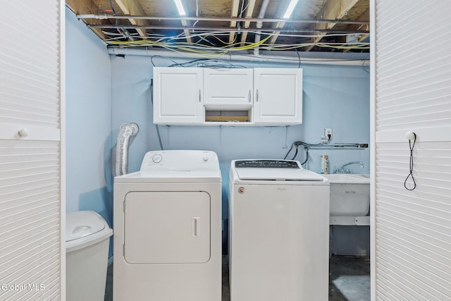145 Sylvia Ln, Rotterdam, NY 12306 - washroom featuring cabinet space and separate washer and dryer