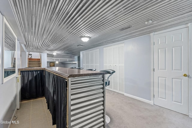 145 Sylvia Ln, Rotterdam, NY 12306 - kitchen with baseboards and dark countertops