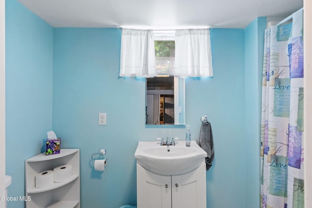 145 Sylvia Ln, Rotterdam, NY 12306 - full bathroom featuring vanity and curtained shower