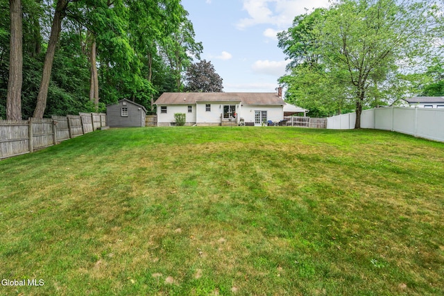 145 Sylvia Ln, Rotterdam, NY 12306 - fenced backyard with a storage unit