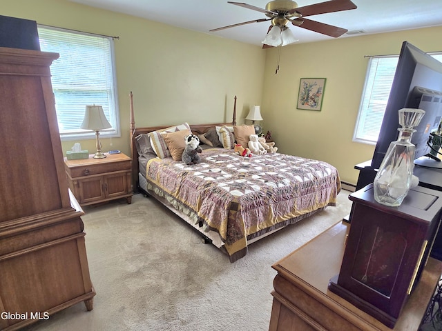 12 Winkel Way, Clifton Park, NY 12019 - bedroom featuring light carpet, ceiling fan, and a baseboard heating unit