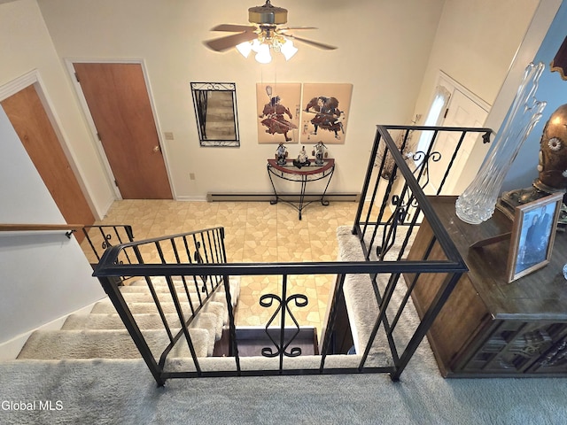 12 Winkel Way, Clifton Park, NY 12019 - stairs with carpet flooring, ceiling fan, a high ceiling, and a baseboard heating unit