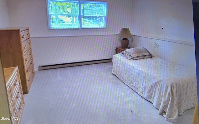 12 Winkel Way, Clifton Park, NY 12019 - bedroom with a baseboard heating unit, wainscoting, and carpet flooring