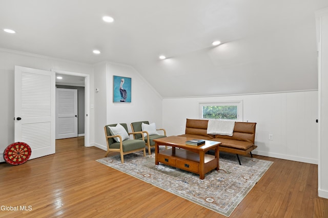 84 Glenwood Ave, Queensbury, NY 12804 - living area featuring wood finished floors, recessed lighting, lofted ceiling, and ornamental molding