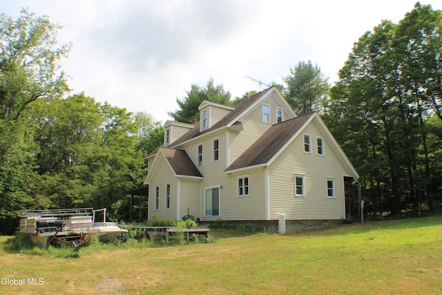 135 Glenwild Rd, Providence, NY 12850 - rear view of property featuring a yard and roof with shingles