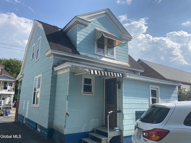1341 7th Ave, Schenectady, NY 12303 - view of home's exterior with roof with shingles