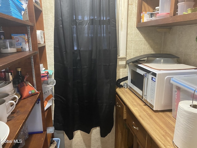 1341 7th Ave, Schenectady, NY 12303 - washroom with tile patterned floors