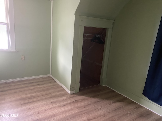 1341 7th Ave, Schenectady, NY 12303 - unfurnished bedroom with light wood-style floors and a closet