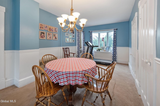 138 Elm St, Cobleskill, NY 12043 - dining space with light carpet and a chandelier