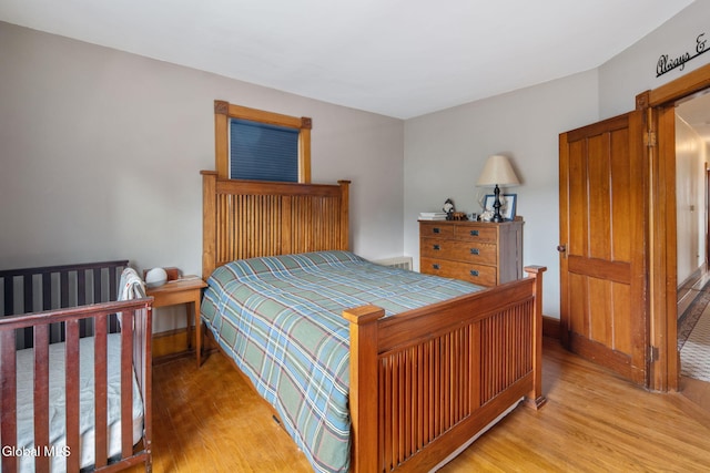 138 Elm St, Cobleskill, NY 12043 - bedroom featuring light wood-type flooring