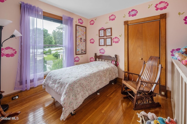 138 Elm St, Cobleskill, NY 12043 - bedroom with wood-type flooring