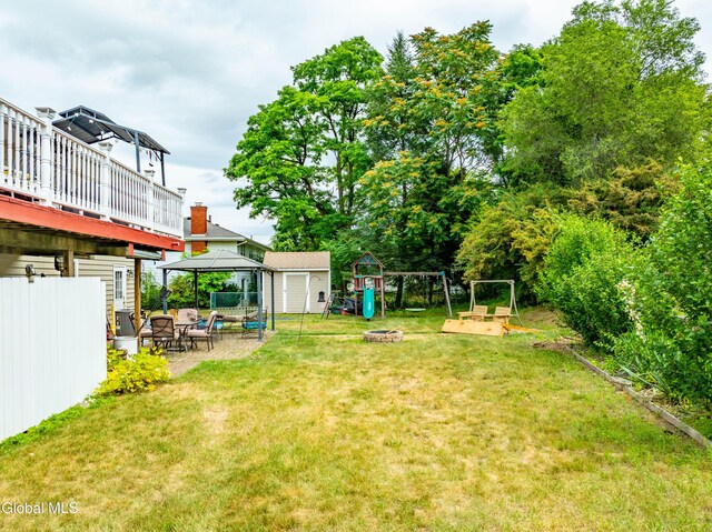 10 Tower Hts, Colonie, NY 12211 - view of yard featuring a gazebo, a playground, an outdoor fire pit, and an outdoor structure