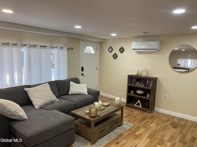 12 Louden Rd, Saratoga Springs, NY 12866 - living room with a wall mounted air conditioner, light wood-type flooring, and recessed lighting
