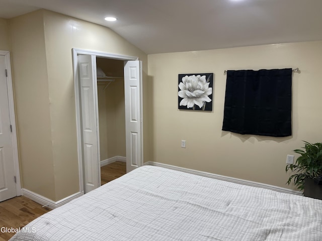 12 Louden Rd, Saratoga Springs, NY 12866 - bedroom with wood finished floors, recessed lighting, and vaulted ceiling